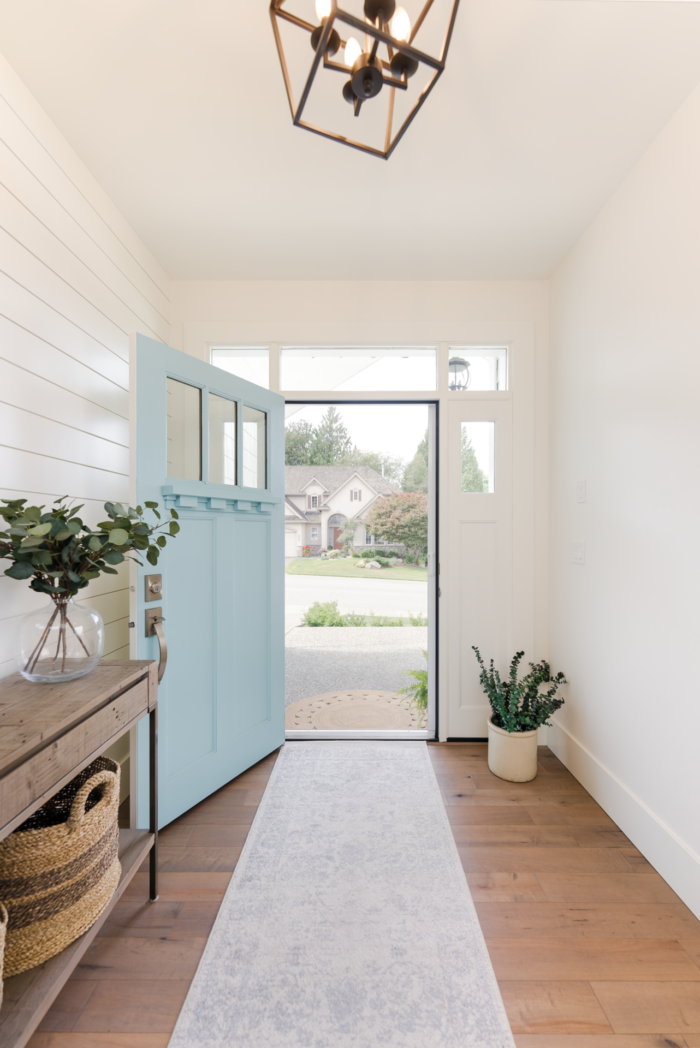 Phantom Retractable Screen Door lets fresh air into modern home.