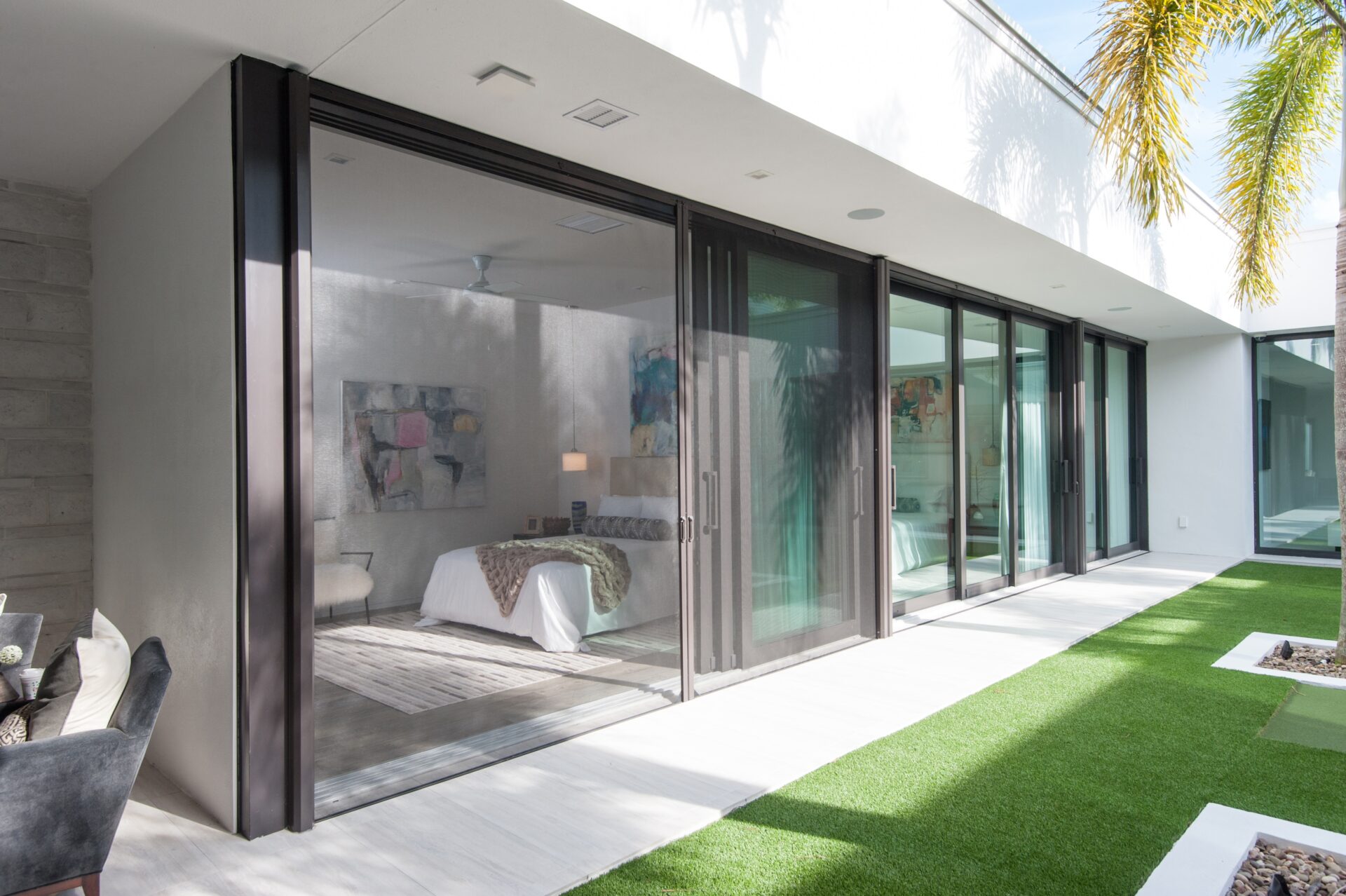 Phantom's Extra-Large Retractable Wall Screen Door spans up to fifteen feet wide per unit and is perfect for bi-fold doors, sliding and folding door systems, and large patio openings.