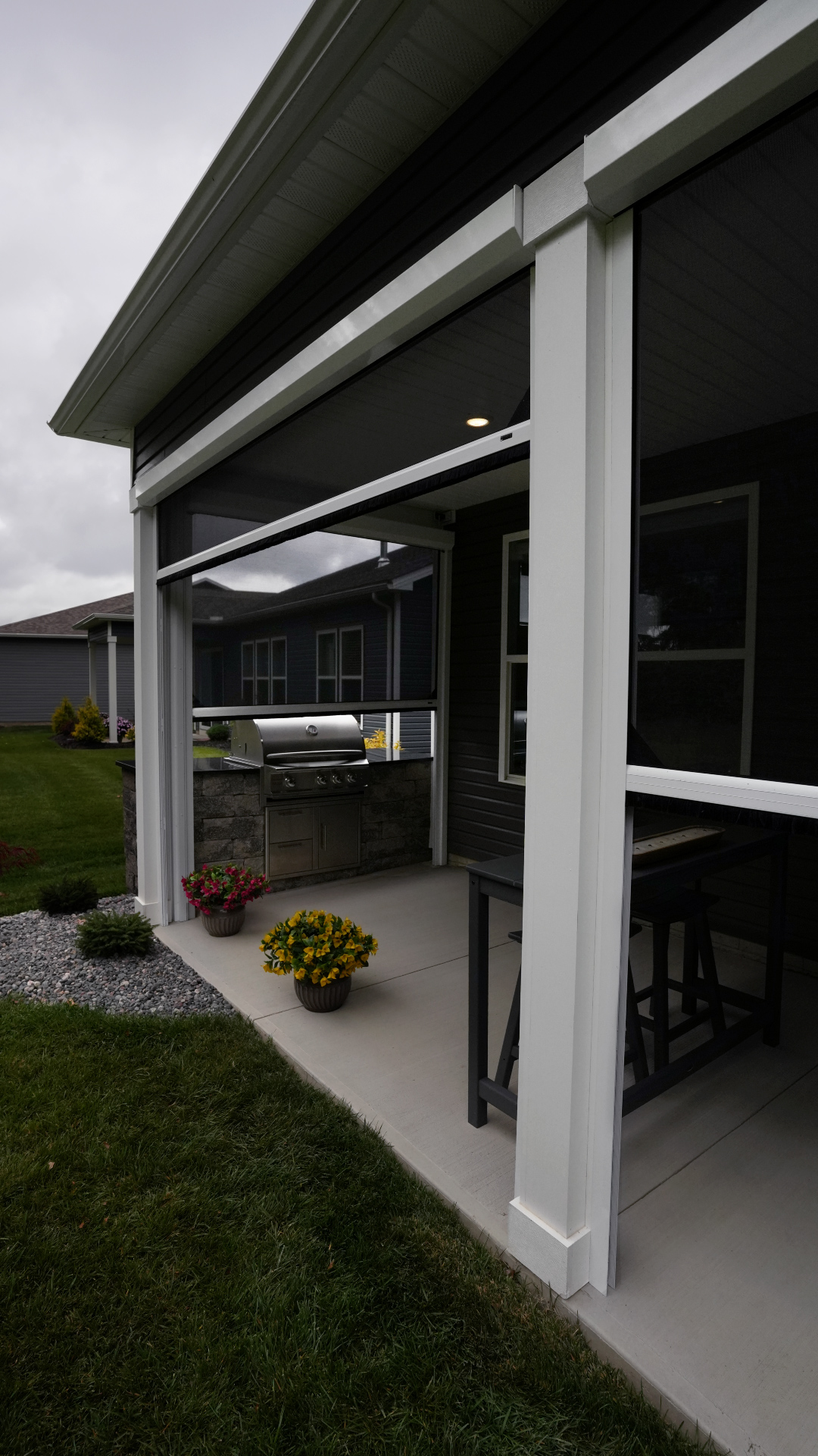 Christmyer Photo 18 The Screening Solutions installation team took this open covered patio in Avon Lake, Ohio and by adding three Phantom Motorized Retractable Screens to the patio’s openings, it’s now a bug-free and breezy outdoor sanctuary. The screens use an insect mesh to keep out bugs while still allowing fresh air to cool down the space and preserve the view out.