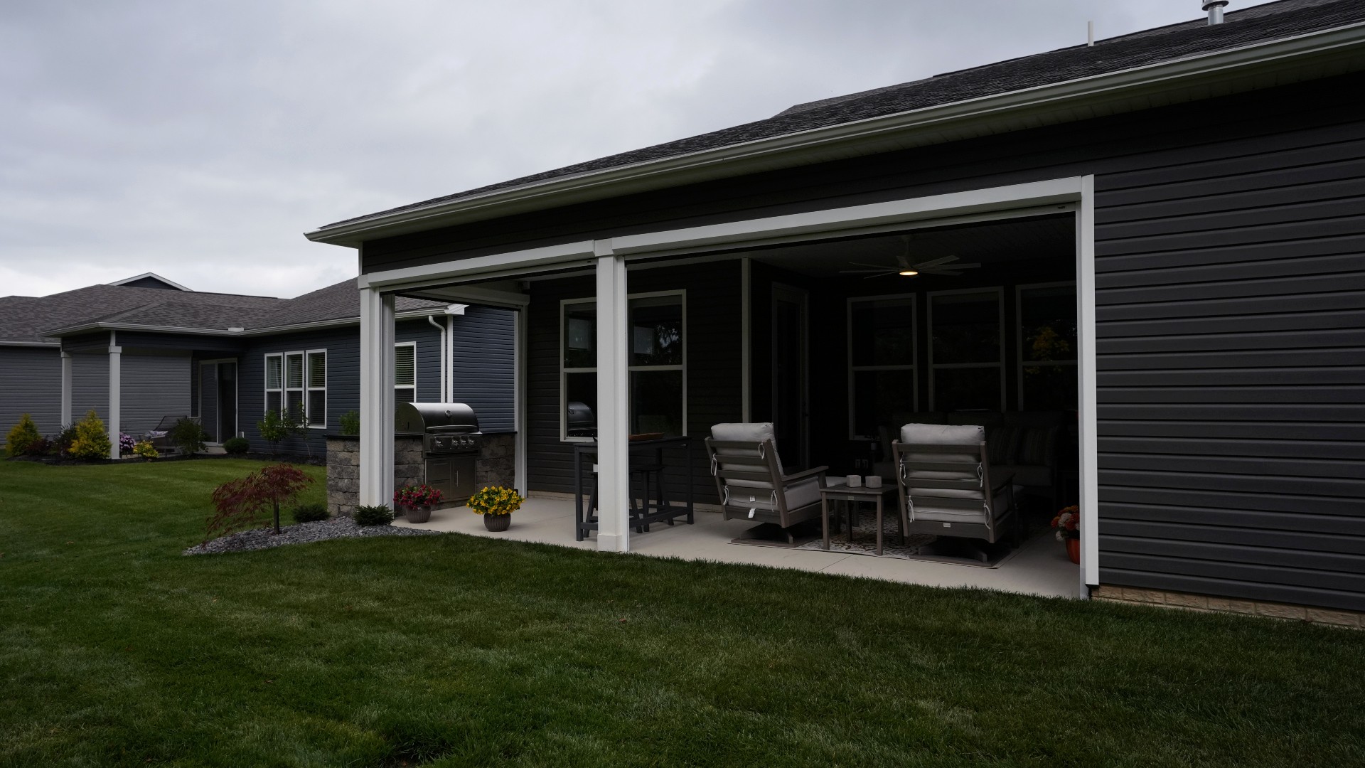 Christmyer Photo 3 The Screening Solutions installation team took this open covered patio in Avon Lake, Ohio and by adding three Phantom Motorized Retractable Screens to the patio’s openings, it’s now a bug-free and breezy outdoor sanctuary. The screens use an insect mesh to keep out bugs while still allowing fresh air to cool down the space and preserve the view out.