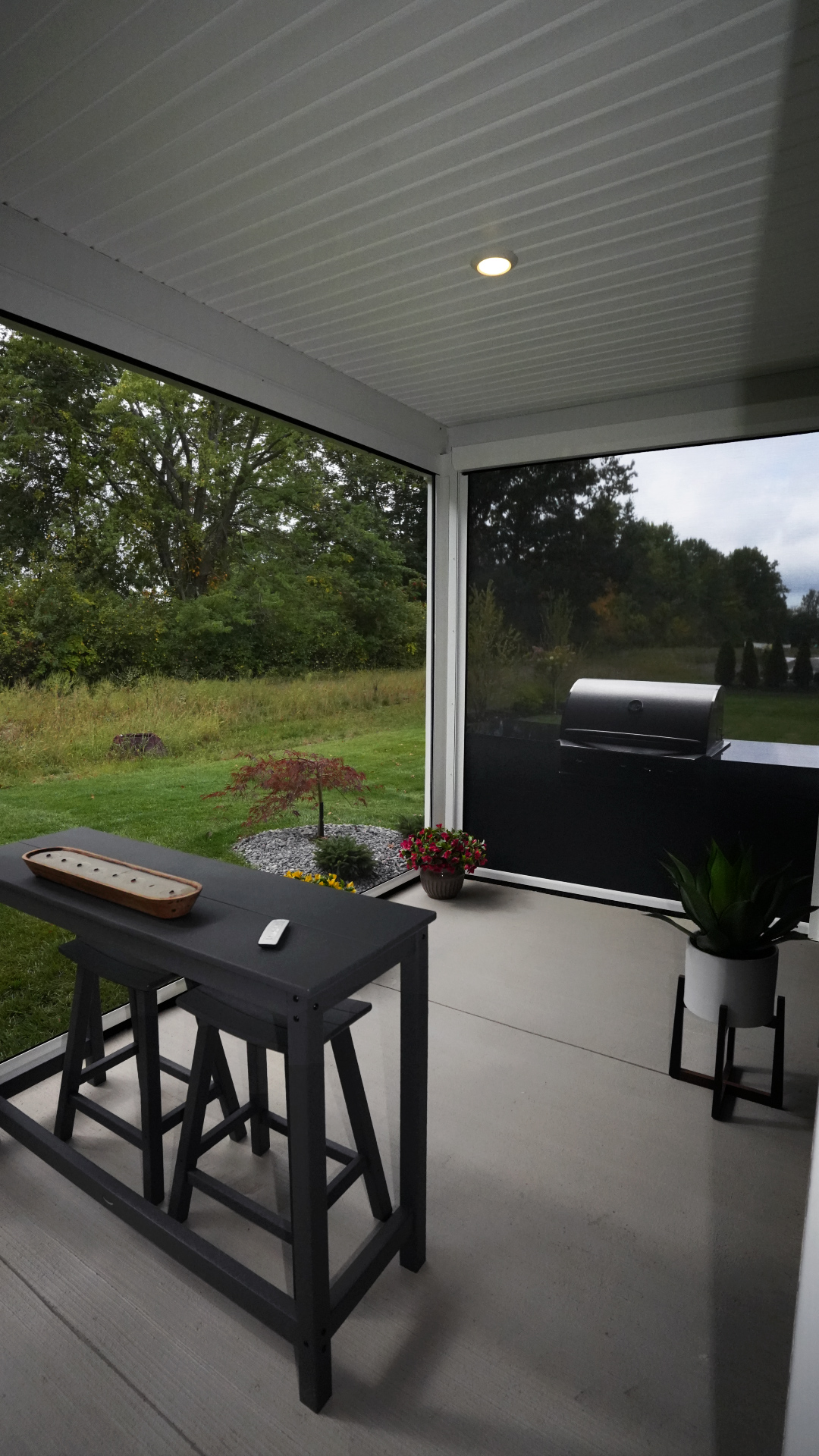 Christmyer Photo 8 The Screening Solutions installation team took this open covered patio in Avon Lake, Ohio and by adding three Phantom Motorized Retractable Screens to the patio’s openings, it’s now a bug-free and breezy outdoor sanctuary. The screens use an insect mesh to keep out bugs while still allowing fresh air to cool down the space and preserve the view out.